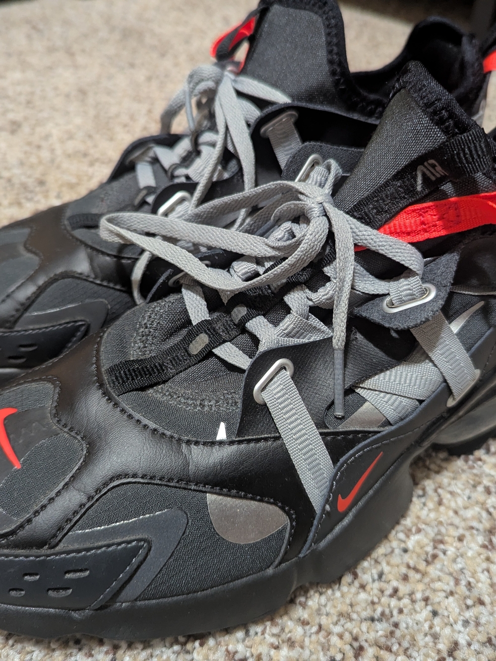 Nike Black and Gray Sneakers with Red Accents